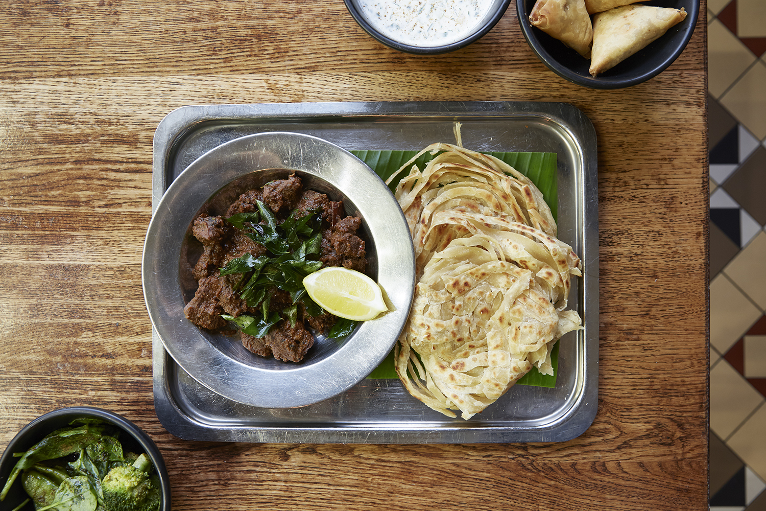 New best indian restaurant Dishoom London City Guide The Better Places Travelblog